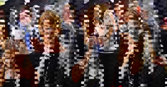 A family crying in a funeral